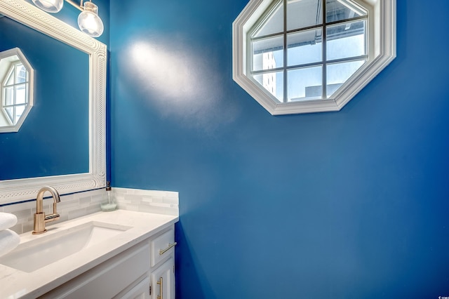 4504 S Ocean Blvd Unit A, North Myrtle Beach, SC 29582 - bathroom featuring decorative backsplash and vanity