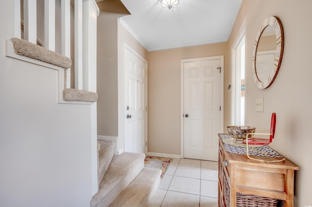 4504 S Ocean Blvd Unit A, North Myrtle Beach, SC 29582 - foyer featuring baseboards, ornamental molding, light tile patterned floors, and stairway