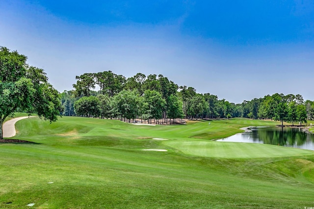 4504 S Ocean Blvd Unit A, North Myrtle Beach, SC 29582 - view of home's community featuring a lawn, a water view, and view of golf course