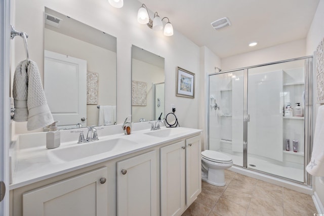 351 Logan St, Little River, SC 29566 - bathroom featuring toilet, double vanity, a stall shower, and tile patterned floors