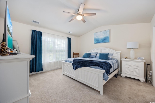 351 Logan St, Little River, SC 29566 - bedroom featuring light carpet, vaulted ceiling, and a ceiling fan