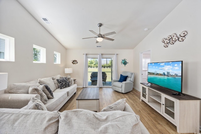 351 Logan St, Little River, SC 29566 - living area with vaulted ceiling, a ceiling fan, and light wood finished floors