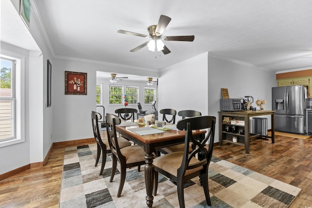 1869 Meadowood Ln, Longs, SC 29568 - dining room with light wood-type flooring, ornamental molding, baseboards, and ceiling fan
