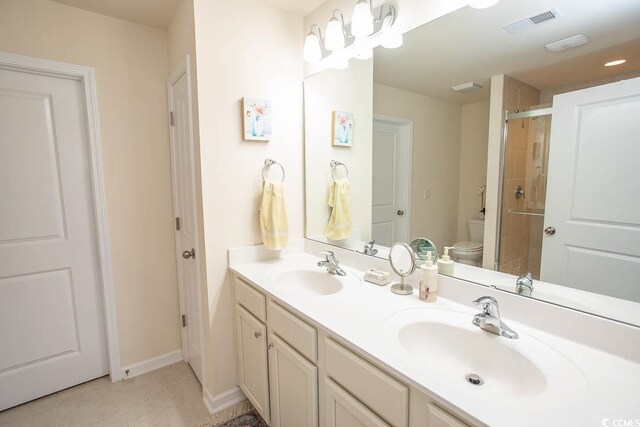 2005 Willow Run Dr Unit C, Little River, SC 29566 - bathroom with a shower stall, toilet, a sink, and visible vents