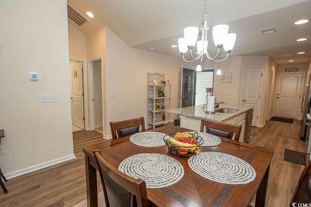 2005 Willow Run Dr Unit C, Little River, SC 29566 - dining space featuring a notable chandelier, visible vents, dark wood-style flooring, and recessed lighting