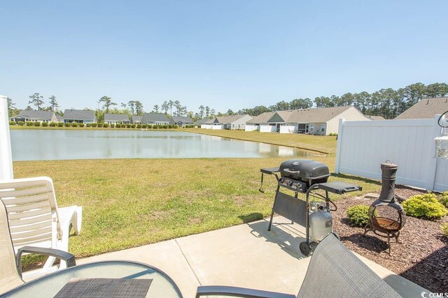 2005 Willow Run Dr Unit C, Little River, SC 29566 - view of patio / terrace with grilling area, a residential view, and a water view