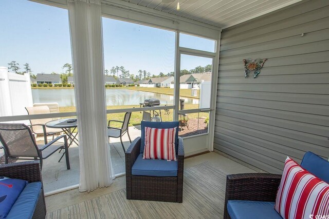 2005 Willow Run Dr Unit C, Little River, SC 29566 - sunroom featuring a residential view and a water view