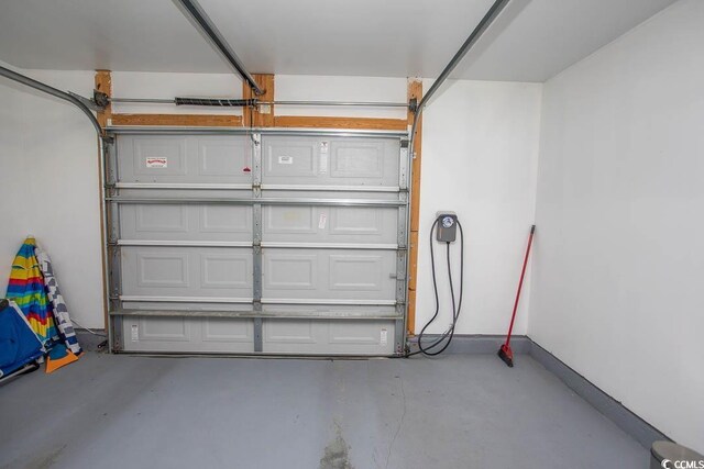 2005 Willow Run Dr Unit C, Little River, SC 29566 - garage with baseboards