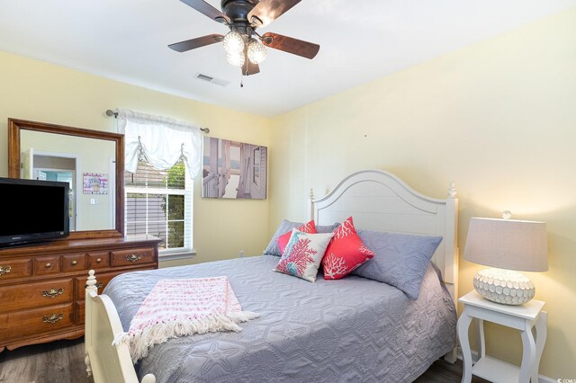 7011 Blade Beak Ln, Myrtle Beach, SC 29588 - bedroom featuring wood finished floors, visible vents, and a ceiling fan