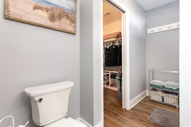 7011 Blade Beak Ln, Myrtle Beach, SC 29588 - bathroom with wood finished floors, visible vents, toilet, and baseboards