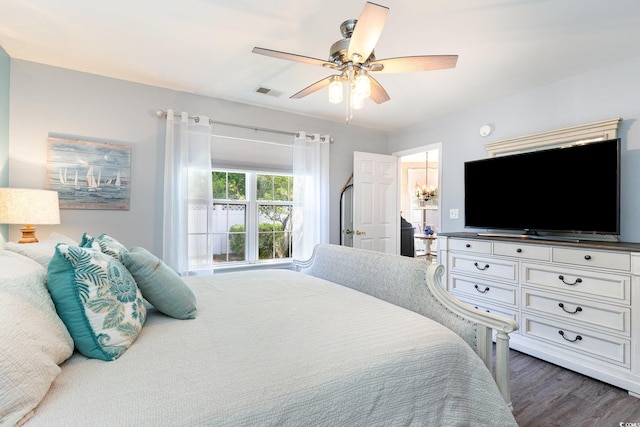 7011 Blade Beak Ln, Myrtle Beach, SC 29588 - bedroom with a ceiling fan, visible vents, and dark wood-style floors