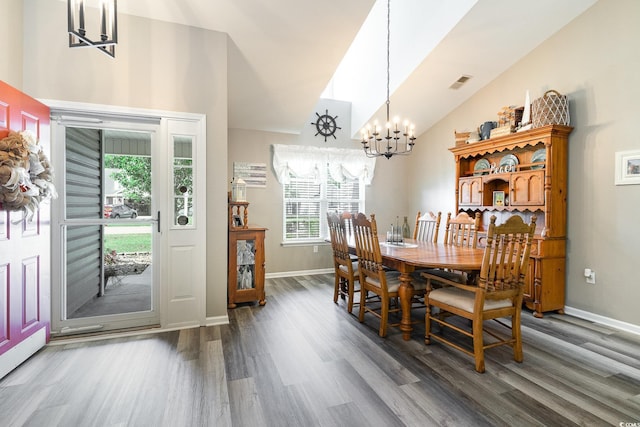 7011 Blade Beak Ln, Myrtle Beach, SC 29588 - dining room with visible vents, baseboards, a chandelier, wood finished floors, and high vaulted ceiling