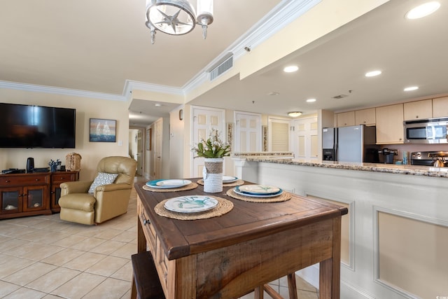 9840 Queensway Blvd Unit 1007, Myrtle Beach, SC 29572 - dining room featuring light tile patterned floors, crown molding, and recessed lighting