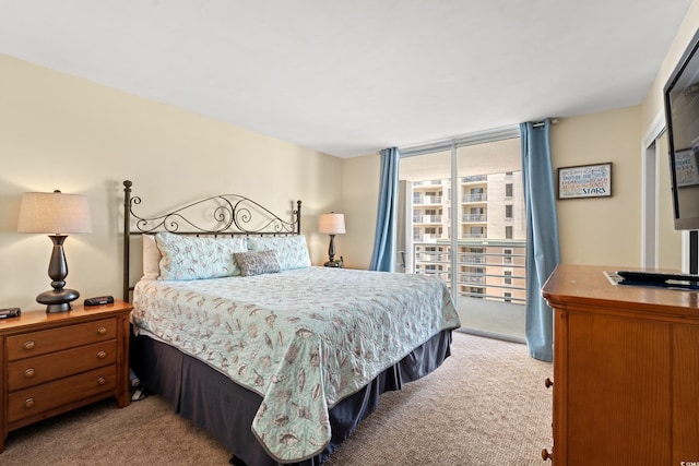 9840 Queensway Blvd Unit 1007, Myrtle Beach, SC 29572 - bedroom with light colored carpet and floor to ceiling windows