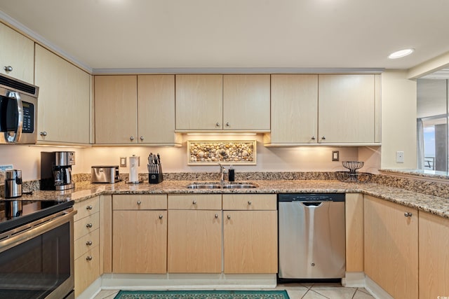 9840 Queensway Blvd Unit 1007, Myrtle Beach, SC 29572 - kitchen featuring appliances with stainless steel finishes, light brown cabinetry, light stone countertops, and recessed lighting