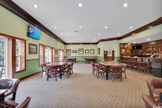 982 Cherrystone Loop, Conway, SC 29526 - carpeted dining space featuring ornamental molding, baseboards, recessed lighting, plenty of natural light, and a community bar