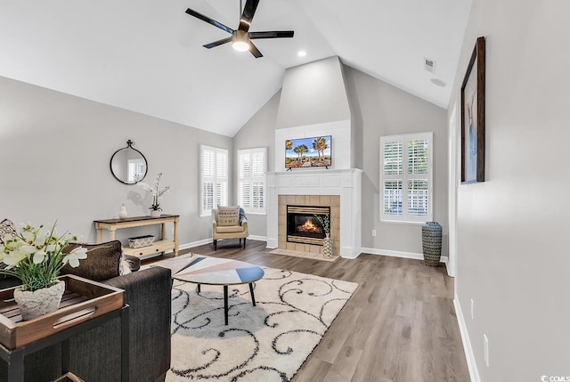 130 Ashton Cir, Myrtle Beach, SC 29588 - living room with a tiled fireplace, visible vents, baseboards, and ceiling fan