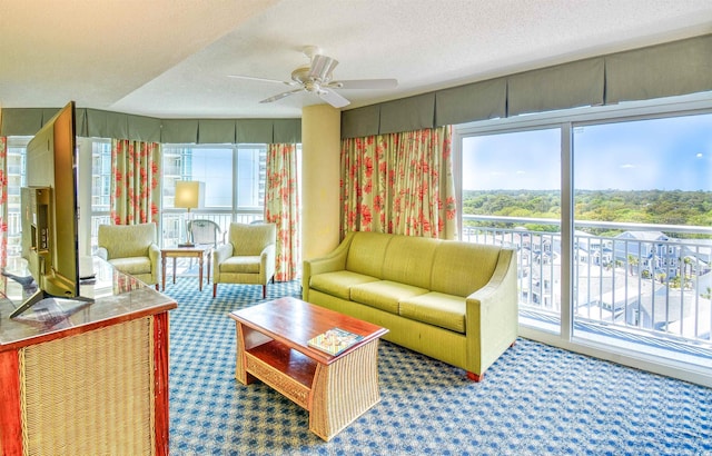 5300 N Ocean Blvd Unit 923, Myrtle Beach, SC 29577 - living room featuring carpet flooring, a textured ceiling, and ceiling fan