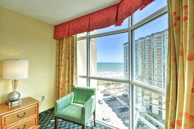 5300 N Ocean Blvd Unit 923, Myrtle Beach, SC 29577 - living area featuring carpet flooring and a water view
