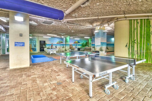 5300 N Ocean Blvd Unit 923, Myrtle Beach, SC 29577 - rec room featuring brick floor