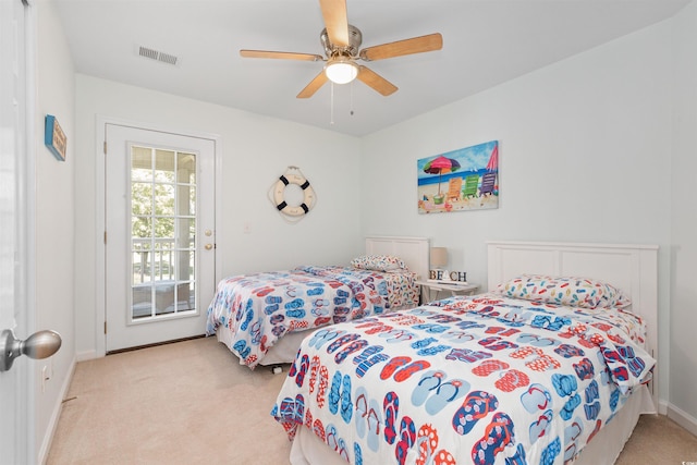 bedroom featuring ceiling fan, carpet, baseboards, and visible vents