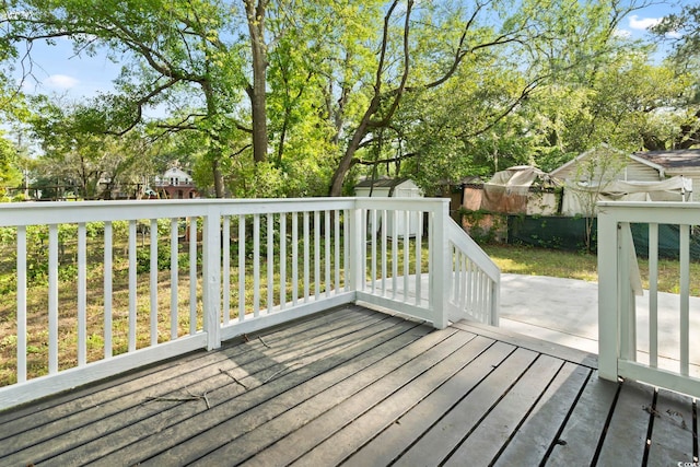 wooden deck featuring fence