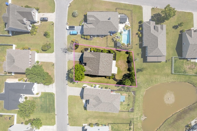 aerial perspective of suburban area featuring property boundaries highlighted