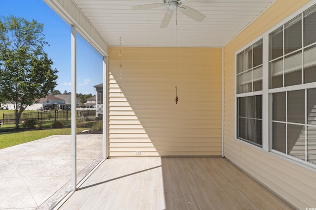 view of patio / terrace featuring a ceiling fan and fence