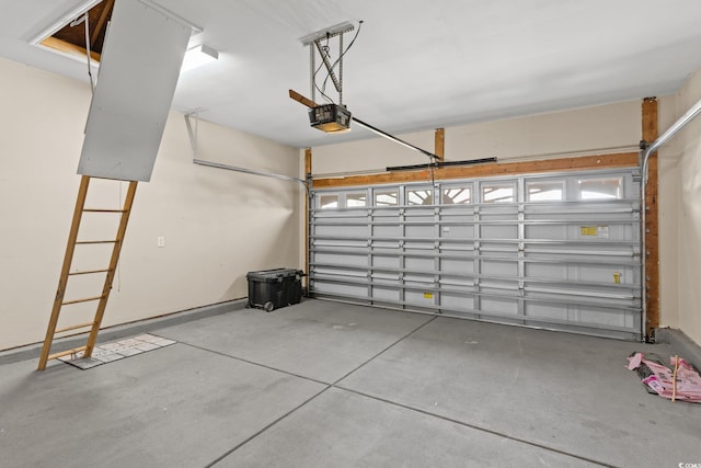 garage featuring a garage door opener