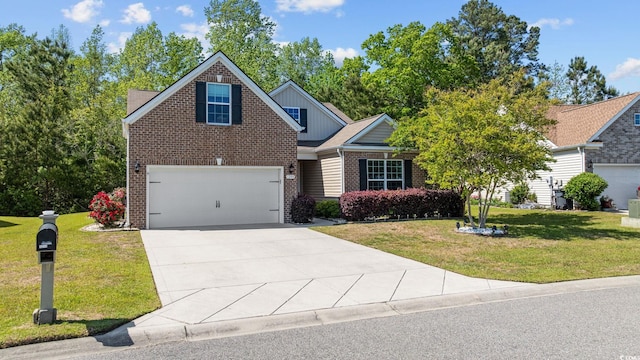 1208 Camlet Ln, Little River, SC 29566 - craftsman-style home with brick siding, concrete driveway, board and batten siding, and a front yard