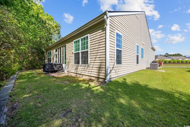 1208 Camlet Ln, Little River, SC 29566 - view of property exterior with central AC unit and a yard