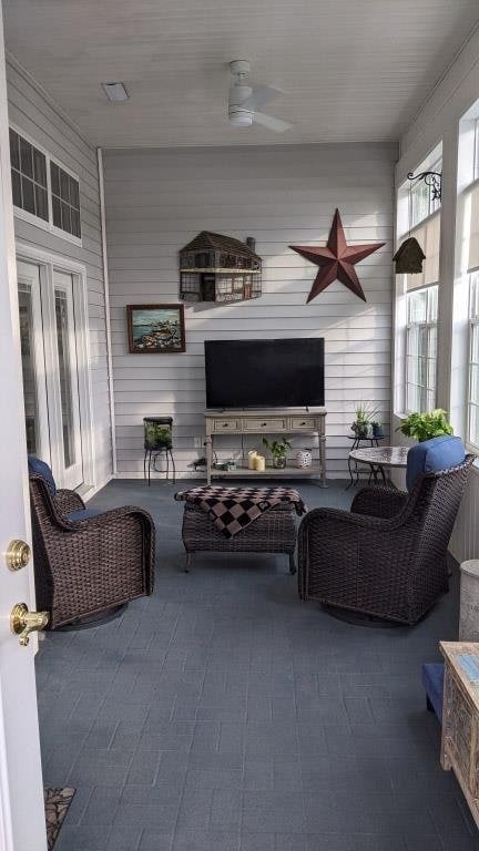 view of patio featuring a ceiling fan