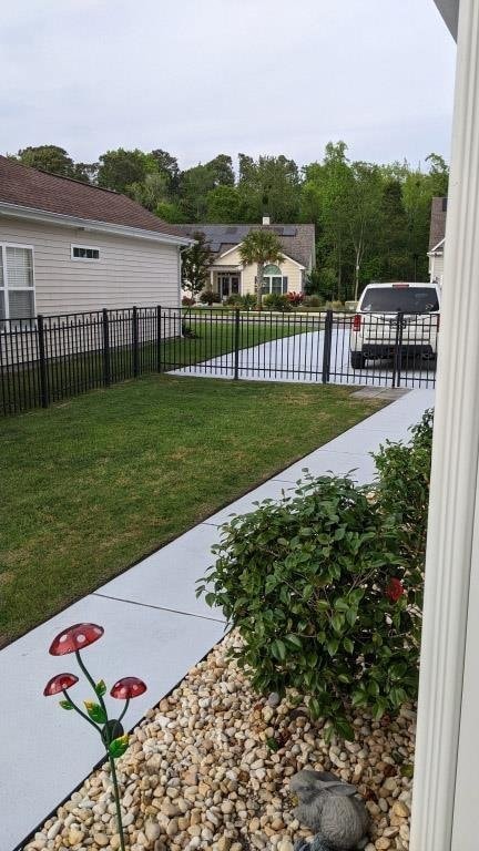 view of yard featuring fence