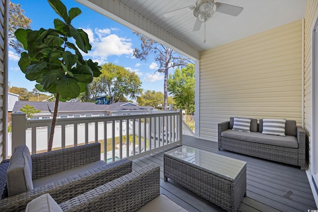 2602 Holly Dr, North Myrtle Beach, SC 29582 - wooden deck with ceiling fan and an outdoor hangout area
