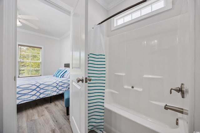 2602 Holly Dr, North Myrtle Beach, SC 29582 - ensuite bathroom featuring wood finished floors, shower / tub combo, ornamental molding, and a ceiling fan