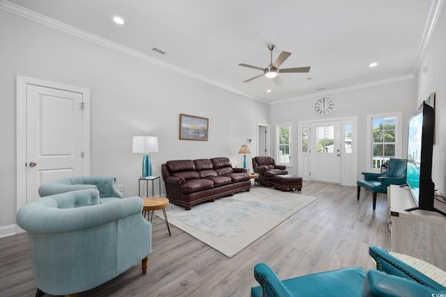 2602 Holly Dr, North Myrtle Beach, SC 29582 - living area featuring ceiling fan, light wood-type flooring, recessed lighting, crown molding, and baseboards