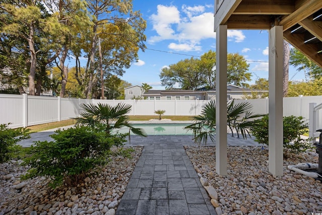 2602 Holly Dr, North Myrtle Beach, SC 29582 - fenced backyard featuring a patio area