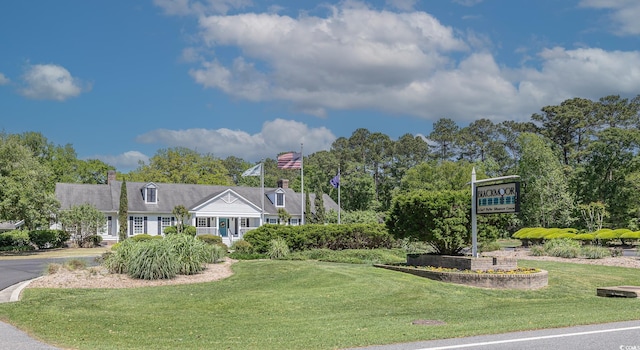 view of community featuring a lawn