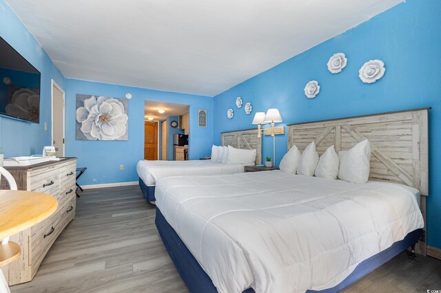 9550 Shore Dr Unit 633, Myrtle Beach, SC 29572 - bedroom with wood finished floors and baseboards