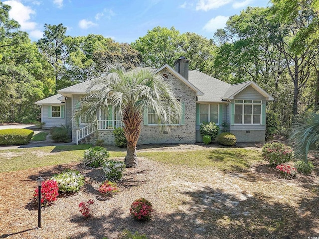321 Heather Ct, Sunset Beach, NC 28468 - single story home featuring a chimney, a front lawn, and crawl space