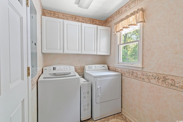321 Heather Ct, Sunset Beach, NC 28468 - laundry room featuring wallpapered walls, cabinet space, and independent washer and dryer