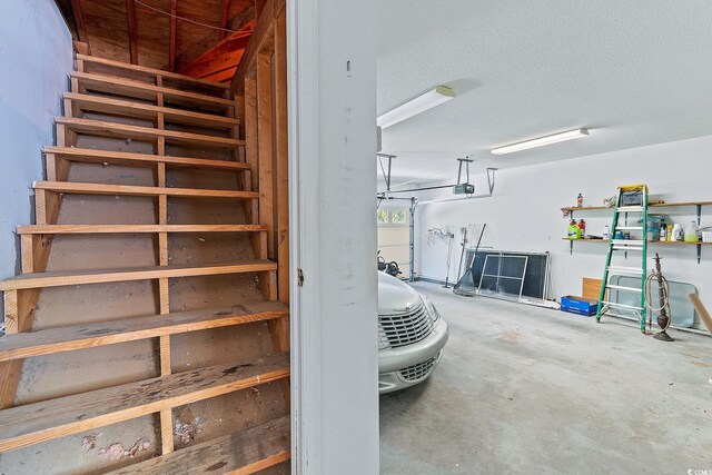 321 Heather Ct, Sunset Beach, NC 28468 - stairs with unfinished concrete floors