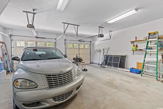 321 Heather Ct, Sunset Beach, NC 28468 - garage with a garage door opener