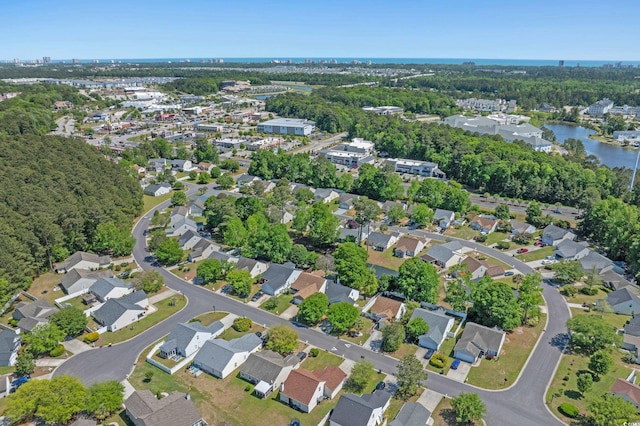 622 Oakhurst Dr, Myrtle Beach, SC 29579 - aerial view of property and surrounding area featuring a large body of water and nearby suburban area