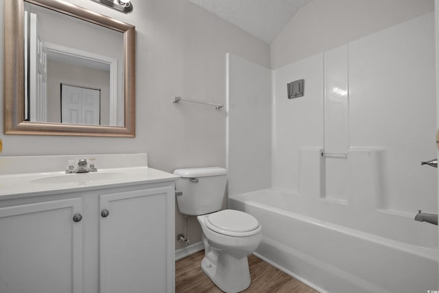 622 Oakhurst Dr, Myrtle Beach, SC 29579 - full bathroom with vanity, toilet, wood finished floors, shower / bath combination, and vaulted ceiling