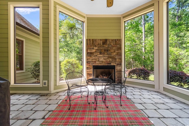 8008 Mcsweeney Ct, Myrtle Beach, SC 29588 - sunroom / solarium with a ceiling fan and an outdoor stone fireplace