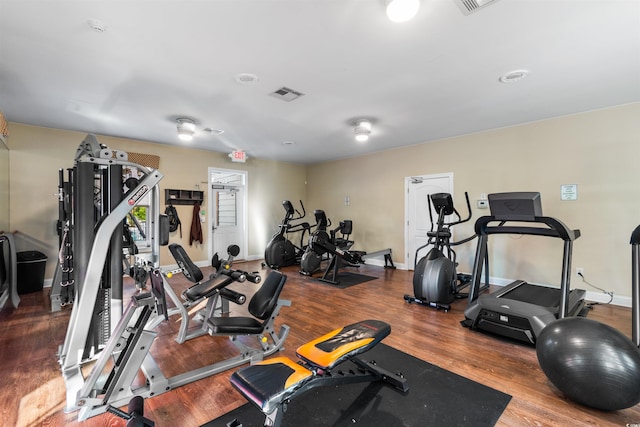 8008 Mcsweeney Ct, Myrtle Beach, SC 29588 - exercise room featuring baseboards, wood finished floors, and visible vents