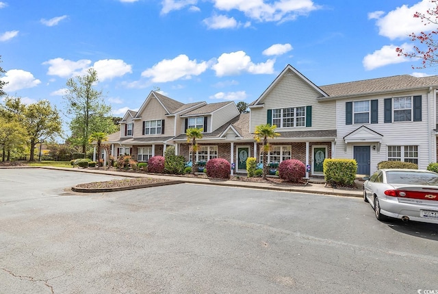 1046 Palisade Cir Unit 1046, Myrtle Beach, SC 29577 - townhome / multi-family property featuring uncovered parking and brick siding