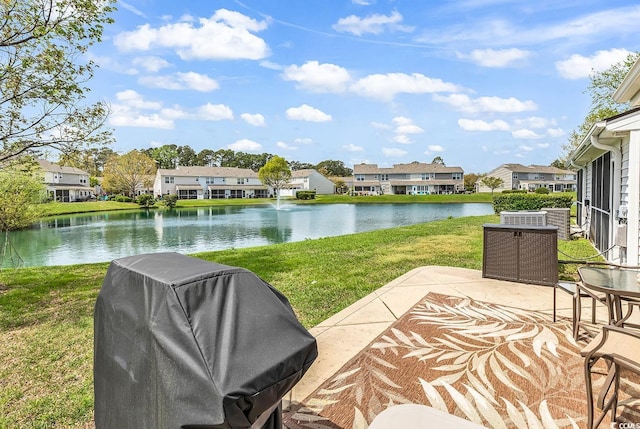 1046 Palisade Cir Unit 1046, Myrtle Beach, SC 29577 - view of patio / terrace featuring a water view, a residential view, and area for grilling