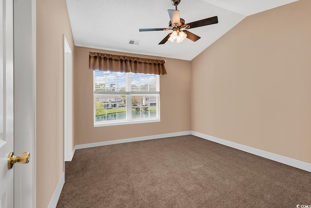 1046 Palisade Cir Unit 1046, Myrtle Beach, SC 29577 - empty room with vaulted ceiling, carpet flooring, a ceiling fan, and baseboards